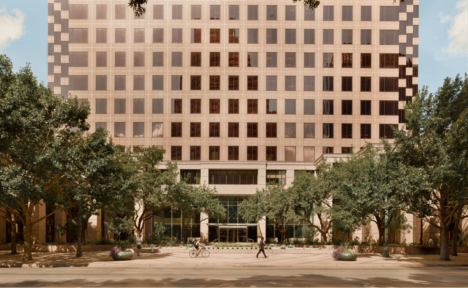 Professional commercial building set in an urban environment, emphasizing accessibility, greenery, and architectural balance